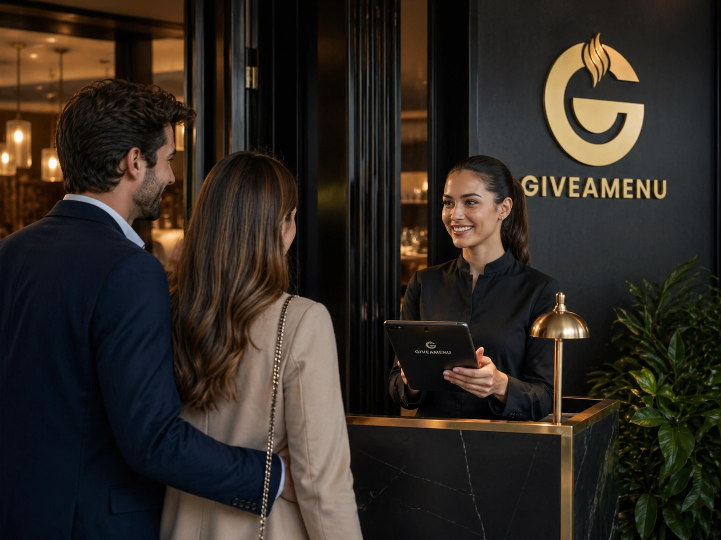Hotel host checking a tablet during guest service.
